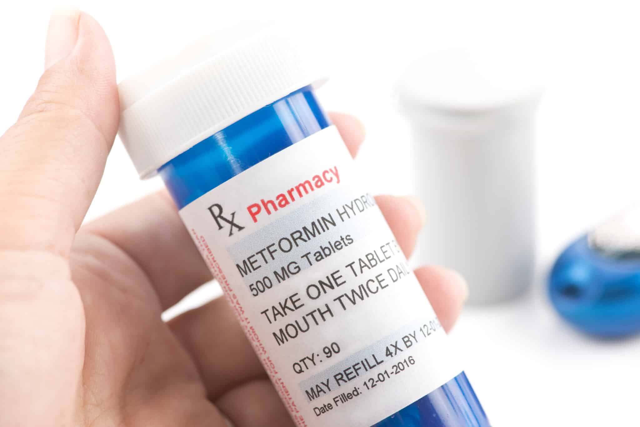 Metformin prescription bottle. Metformin is a generic medication name and label.